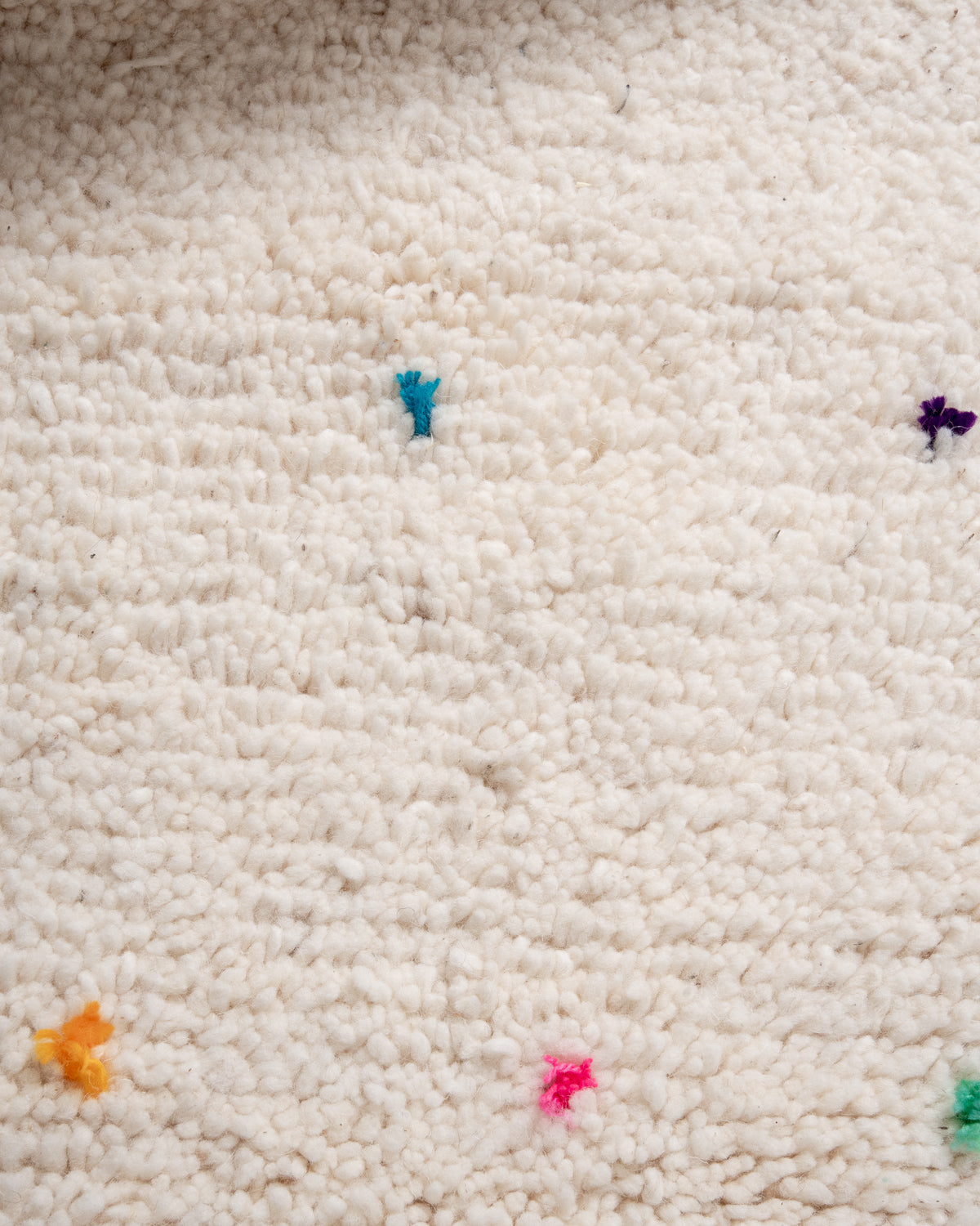 Modern, designer, handcrafted Berber rug from Morocco. Beniourain carpet with beautiful colours and patterns and fluffy wool texture.